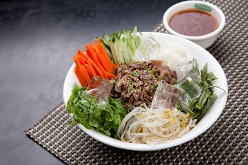Tasty and spicy Bibim rice noodles made with fresh beef and vegetables