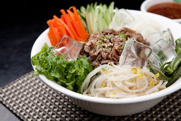 Tasty and spicy Bibim rice noodles made with fresh beef and vegetables