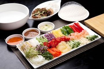 Fresh vegetables, delicious meat, rice noodles, rice wrapped with rice paper