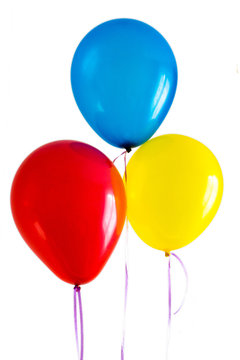 blue red yellow bright balloons isolated on white
