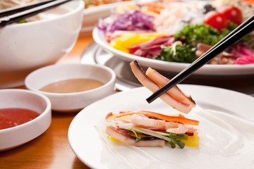 Fresh vegetables, delicious meat, rice noodles, rice wrapped with rice paper