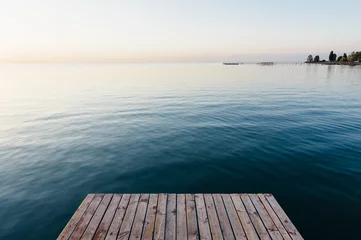 Fototapete Rund Empty pier on Lake Issyk-Kul in Cholpon-Ata, Kyrgyzstan. Sunrise time © andrii_lutsyk