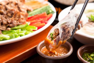 Fresh vegetables, delicious meat, rice noodles, rice wrapped with rice paper