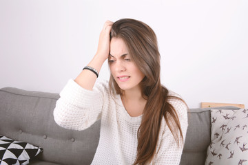 Naklejka premium Young woman worried.