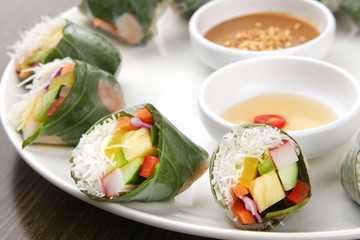 Spring rolls made from fresh vegetables and meat with peanut butter sauce