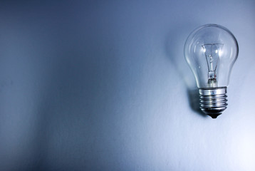 light bulb on gray background