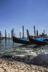 Fototapeta na wymiar Gondolas and San Giorgio maggiore, view from San Marco square, in Venice, Italy