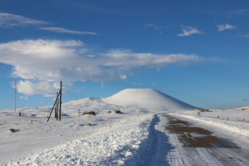 Fantastic winter panorama of a dormant volcano from the top of the Selim pass, Armenia. This view is typical for Iceland and unbelievable for Armenia