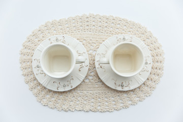 two white cup on the white background.