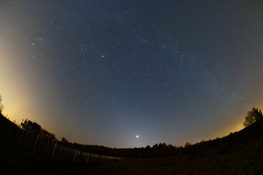 Astro landscape with the Milky Way and the bright Venus as seen from the Palatinate Forest in Germany.