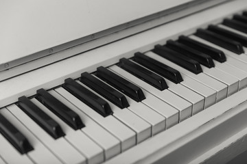 Piano keyboard closeup with.