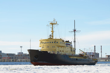 Fototapeta premium The powerful icebreaker breaks the ice.