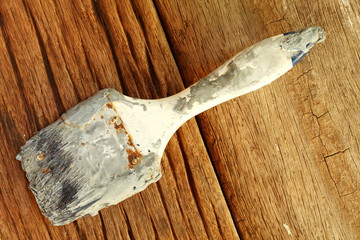 Old and dirty paint brush represent painting equipment material concept related idea.