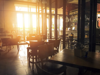 Coffee Cafe interior with harsh sunset light