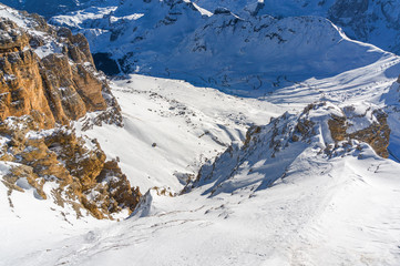 Sunny view of Dolomite Alps from viewpoint of Passo Pordoi near Canazei of Val di Fassa, Trentino-Alto-Adige region, Italy.