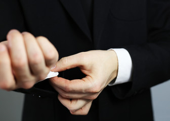 business man in a black suit. correct clothing