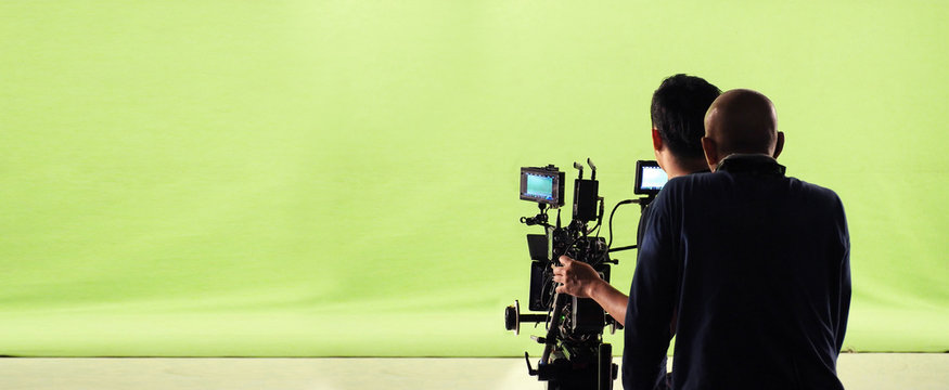 Camera and green screen studio in panorama view.