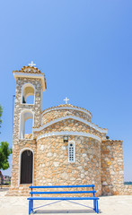 Stone church on blue sky, Cyprus