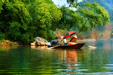 Traveling by boat on streams YEN in Hanoi, Vietnam.