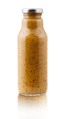 Banana and ginger detox juice bottle isolated on white background