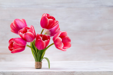 Pink tulips, spring flowers and Easter decoration.