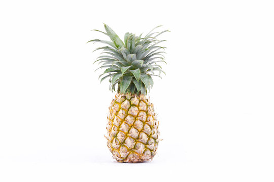 ripe  pineapple (Ananas comosus) on white background healthy pineapple fruit food isolated
