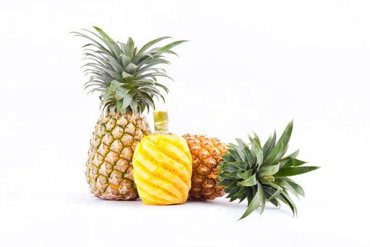 peeled  pineapple and fresh ripe pineapple  on white background healthy pineapple fruit food isolated
