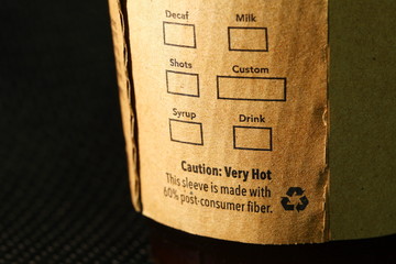 The coffee cup brown color paper label represent the coffee and cold beverage business concept...