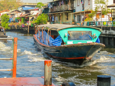 Ferryboat, public motorboat on small channel. Bangkok, Thailand