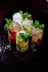 icy cocktails on black background