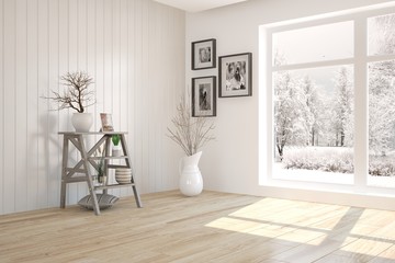 White room with shelf and winter landscape in window. Scandinavian interior design