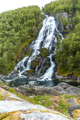 Scenic view of Ryfylke waterfall in Norway, Europe. Concept of peace and tranquility.