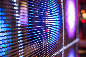 Bright colored LED video wall with high saturated pattern - close up background with shallow depth...