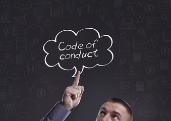 Business, Technology, Internet and marketing. Young businessman thinking about: Code of conduct