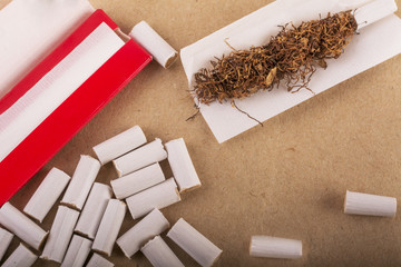 Tobacco and accessories for hand-rolling of cigarette.