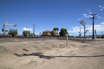 Fototapeta na wymiar Road and Railroad Junction Santa Fe line