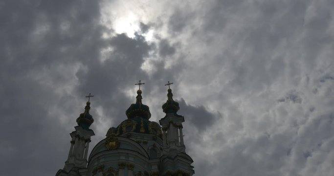 Impressive Golden Domes of the Saint Andrew's Church Overlooking the Historic Podil Neighborhood in a Grey Weather in Summer