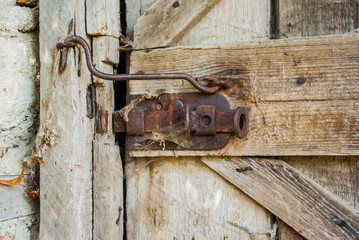 Old wood door with padlock