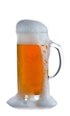 glass of beer with foam on a white background