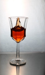 wine splashing in a glass