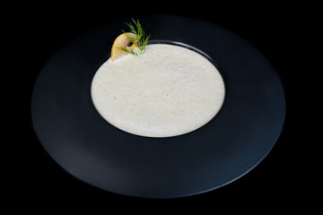 mushroom soup on black background