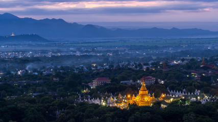 Beautiful Khuthodaw Pagoda with light in the early morning view from Mandalay hill, Myanmar