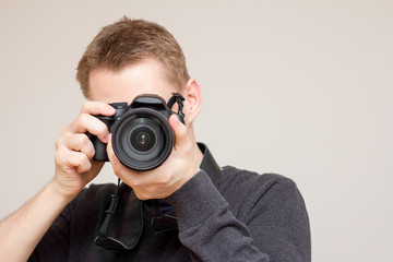 photographer taking picture with white background