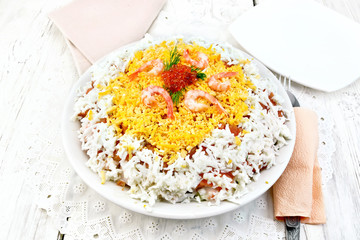 Salad of salmon and seafood on light table