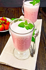 Soup strawberry in goblet on board