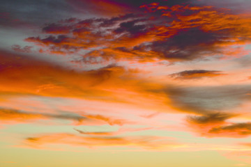Orange sky of clouds during sunset.