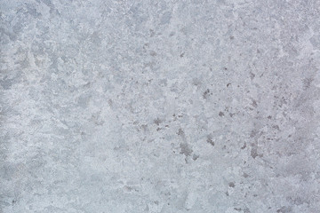 Abstract Texture background of frost rime ice pattern on glass window during winter in Europe