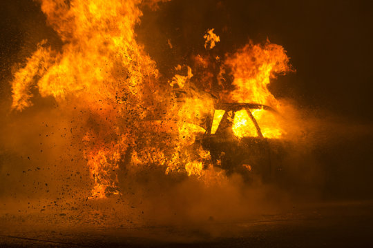 Burning Car On The Road In Night