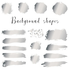 Silver ink borders, brush strokes, stains, banners, blots, splatters. Vector set of hand drawn grunge elements isolated on white background. 