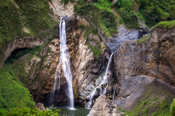 Fototapeta na wymiar Waterfalls along the Waterfall route near Banos, Ecuador